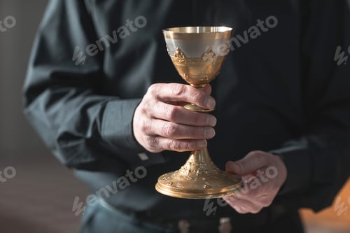 Preview: Priest holding the cup