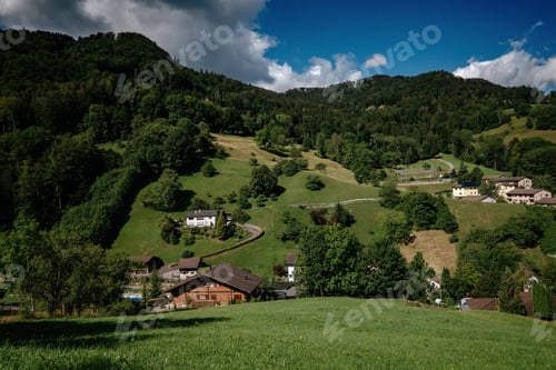Preview: Summer view of a beautiful apline village in Switzerland