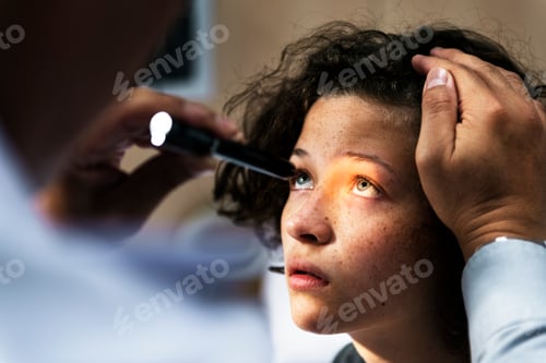 Preview: Young Caucasian girl getting an eye examination