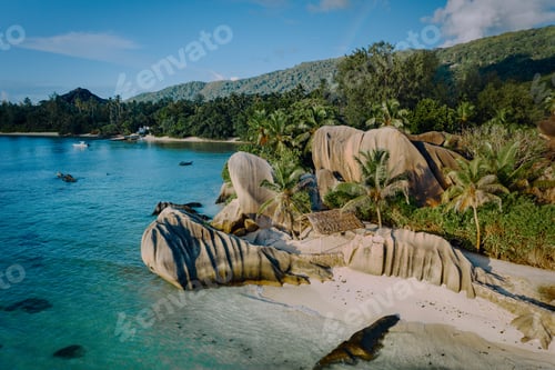 Preview: Aerial drone view of unique Anse Source D'Argent tropical beach, La Digue Seychelles. Luxury