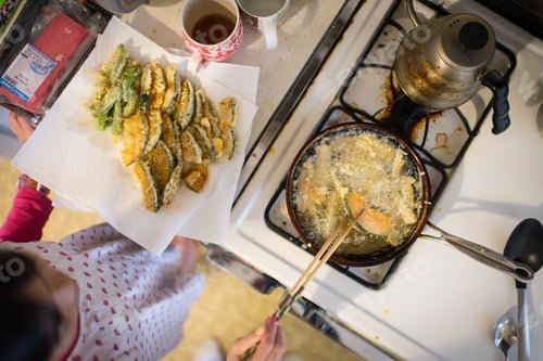 Preview: Girl frying Japanese tempura from above