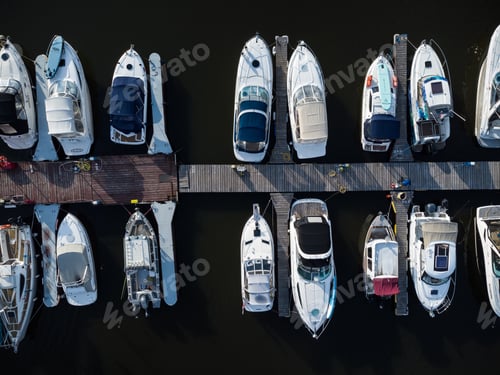 Preview: Bird's-eye view of luxury yachts and speedboats in the marina and yacht club.