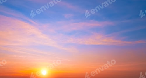 Preview: Colorful sunrise sky in the morning with orange sunlight clouds on idyllic horizontal sky background