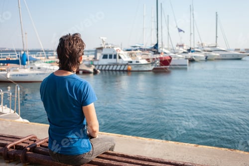 Preview: Tourist in seaport. Yachts in the parking lot, seaport