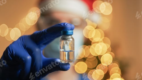 Preview: Doctor with vaccine on Christmas Background