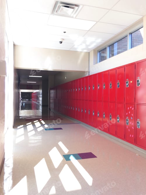 Preview: empty high school hall hallway with a row of bright red student lockers , vertical oriented