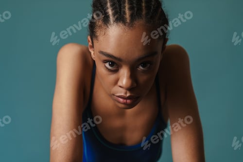 Preview: Close up portrait of a young african woman in swimsuit