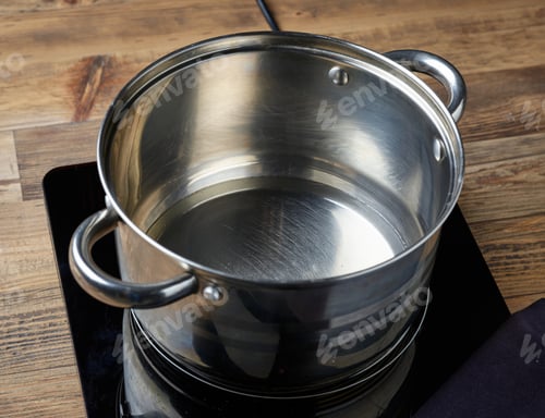 Preview: kettle of water on electric induction hob