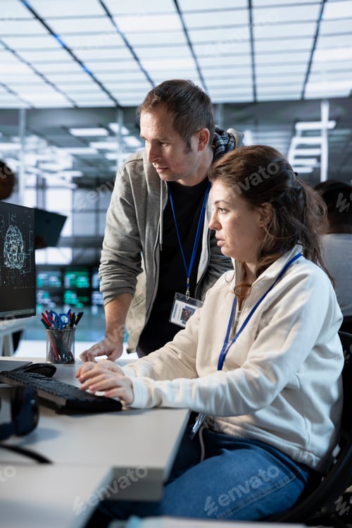 Preview: Worker requesting help from senior engineer to fix error in high tech data center