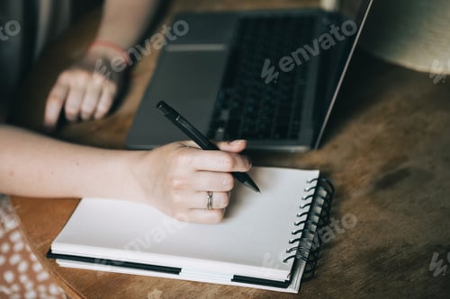 Preview: Writing in a notebook