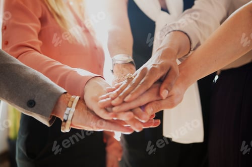 Preview: Women joining hands in the middle