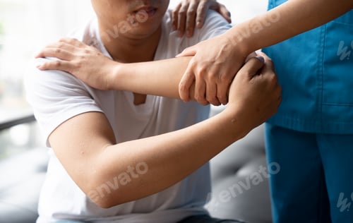 Preview: Physical therapy concept, Asian man is admitted to physiotherapy in a hospital.