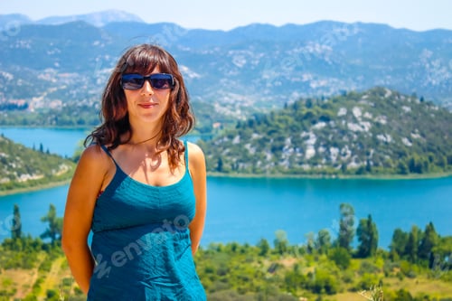 Preview: A young girl by the lake in Ston, Croatia