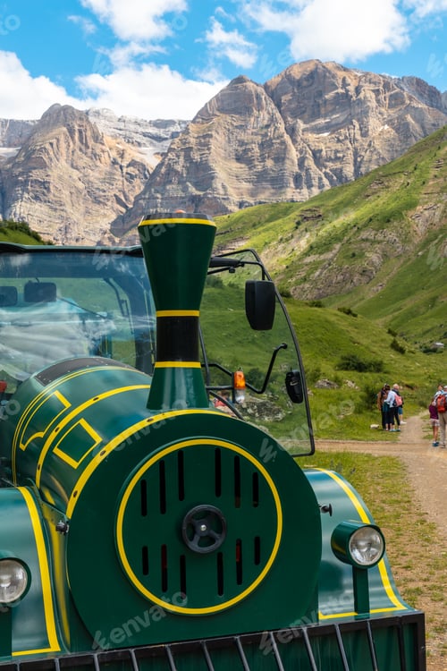 Preview: Detail of the mountain train towards Panticosa from the Ripera valley with tourists, Pyrenees