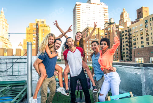 Preview: Group of friends having party on a rooftop
