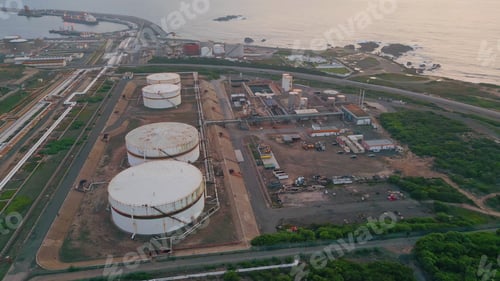 Preview: Drone oil terminal plant at sea port. Fossil fuel energy industry placed coast