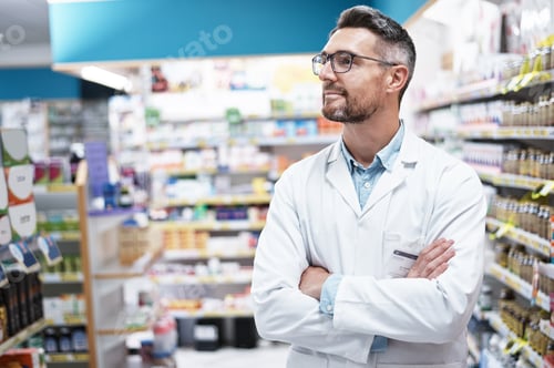 Preview: Theres always room for expansion. Shot of a confident mature pharmacist working in a pharmacy.