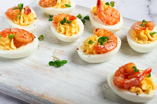 Preview: Boiled eggs stuffed with yolk and seasoned with mayonnaise, stuffed eggs with shrimp,