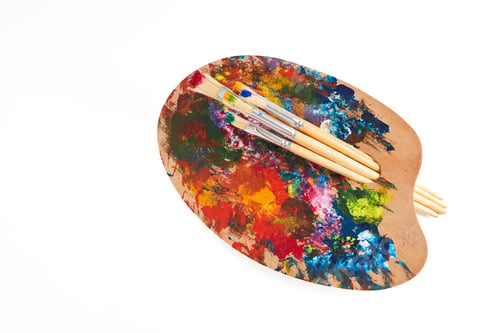 Preview: Wooden art palette with brushes isolated on white background.