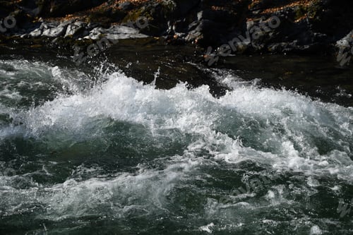 Preview: Splash of water in mountain river