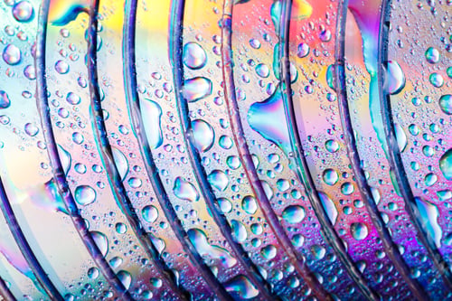 Preview: Colorful, Rainbow, Abstract Background. Water Drops. Condensate. Texture Of Glass. Parallel Lines