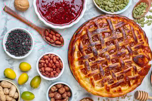 Preview: top view yummy fruity pie with nuts and eggs on the light background bake biscuit pie dessert tea