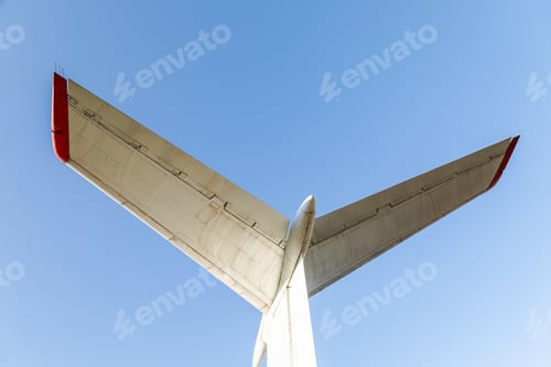 Preview: Airplane tail on a blue sky