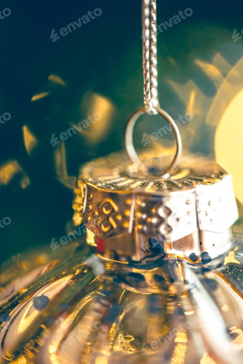 Preview: Christmas tree decoration close up, ball bauble in pine branches background.