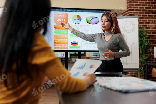 Preview: Executive manager explaining management statistics