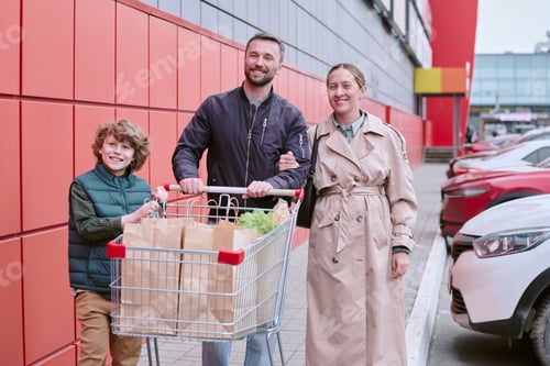 Preview: Family Shopping Together at Outdoor Grocery Store