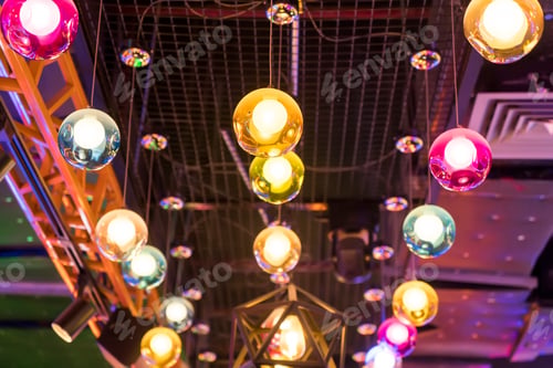 Preview: Colorful Bright Lamps Against A Dark Background