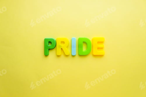 Preview: Pride color letters word on a yellow background