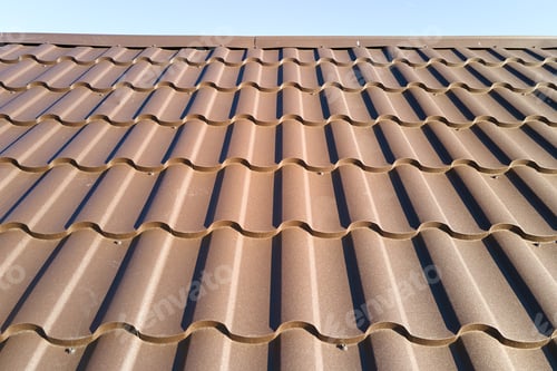 Preview: Closeup of house roof top covered with metallic shingles