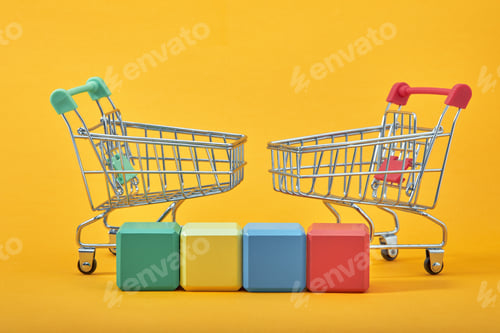 Preview: empty wooden cubes mockup style, copy space with shopping trolleys on yellow background. Colourful
