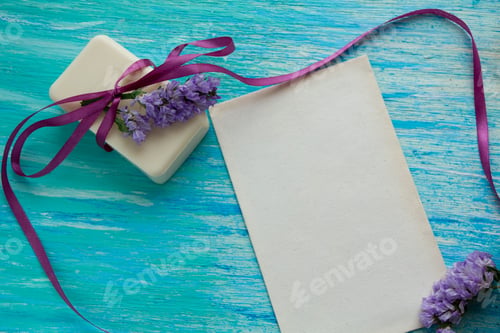 Preview: mockup natural organic soap with flowers on wooden table