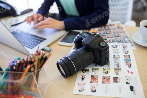 Preview: Female executive working at her desk