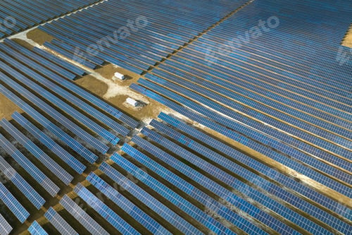 Preview: Aerial view of big sustainable electric power plant with many rows of solar photovoltaic panels