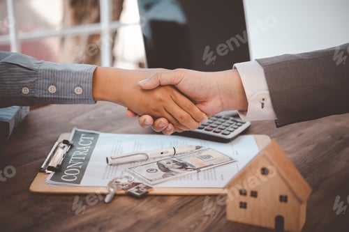 Preview: Real estate agents and Clients join hands to congratulate them on achieving contractual agreements