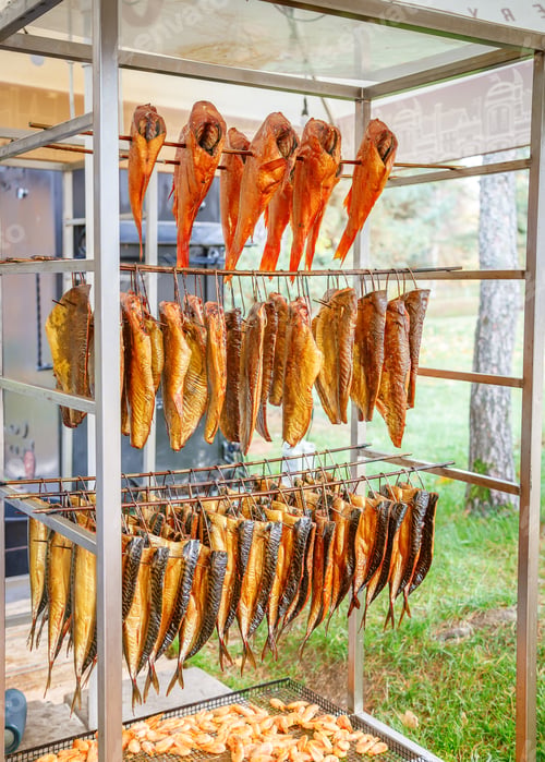 Preview: Freshly smoked fish and seafood are beautifully displayed at a local market