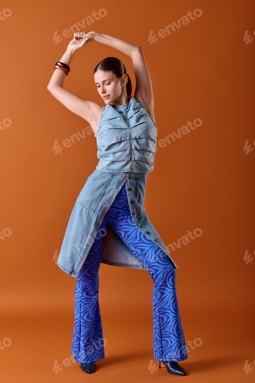 Preview: Young stylish woman showcases her unique fashion sense in a vibrant and artistic pose
