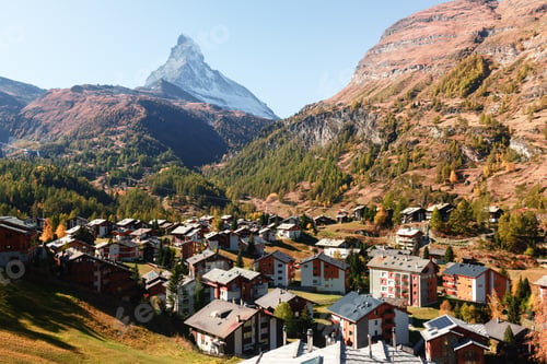 Preview: Picturesque autumn view of Zermatt city street with Matterhorn peak
