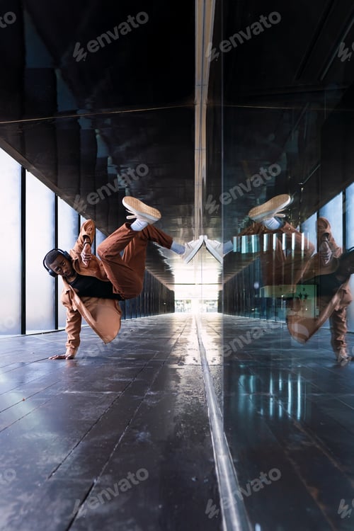 Preview: Black man dancing while listening to music