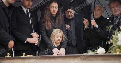 Preview: Loss, grief and people at funeral with umbrella, flowers and coffin, family with sad child at servi