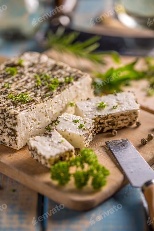 Herb Cheese on a Wooden Board