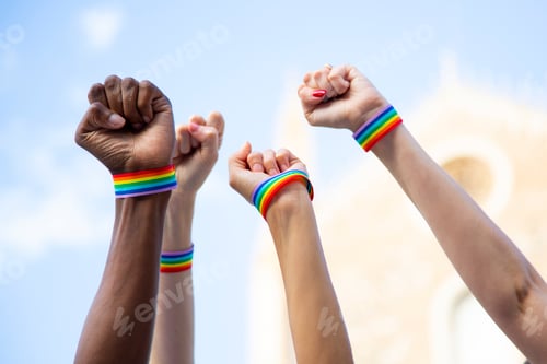 Preview: Four fists claiming gay pride rights with gay pride bracelet