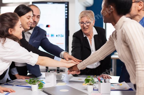 Preview: Cheerful overjoyed business people in conference room celerating