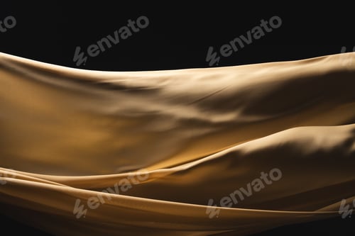Preview: Close up of gold shiny silk fabric with copy space on black background