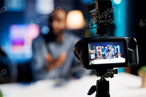 Preview: Man Recording Video in Home Studio Setup