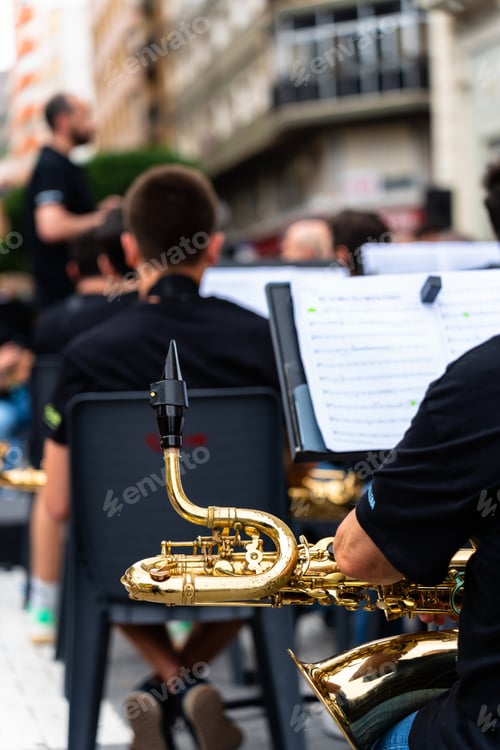 Preview: Brass musicians from a band with a saxophone