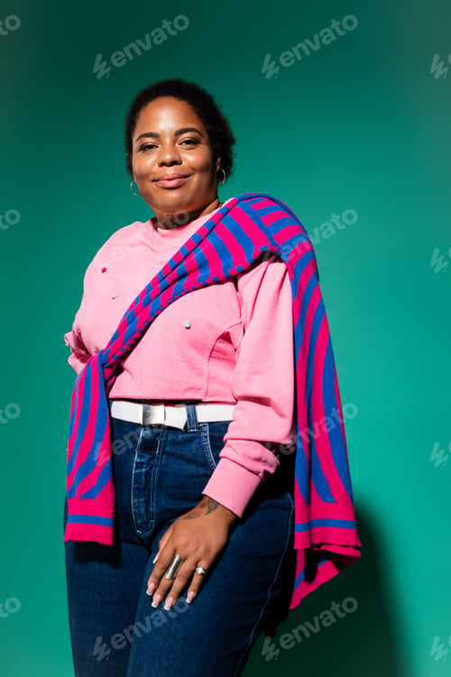 Preview: Chic autumn fashion with a plus-size Black woman in a trendy studio